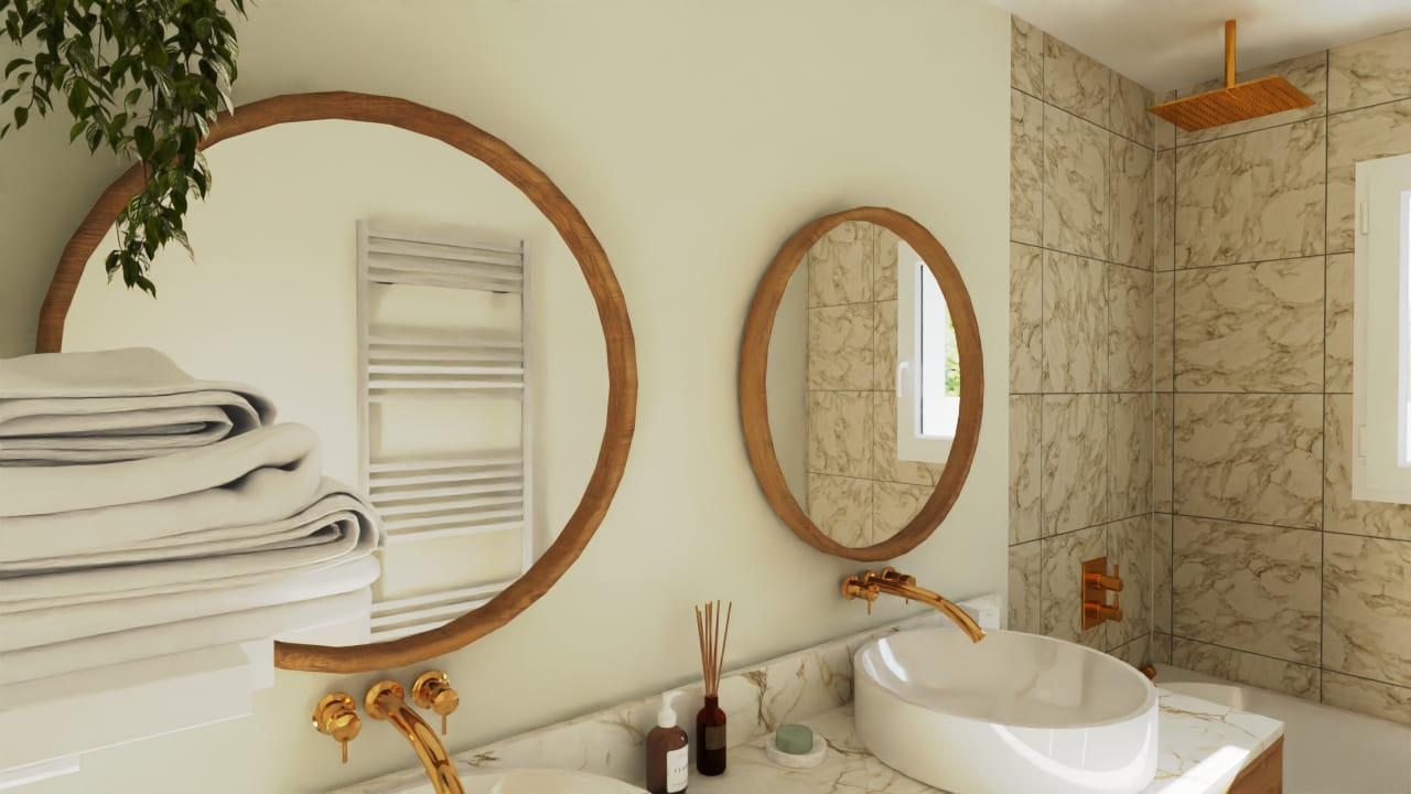 Salle de bain élégante avec miroirs ronds et détails dorés